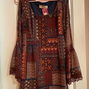 Beautiful Lucy love shift dress with long bell sleeves that are shear. Size XS
